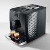 Machine espresso noire marque JURA vu  de haut avec une plaque texturée argentée