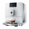 Machine espresso Jura en blanc avec une tasse de cappucino