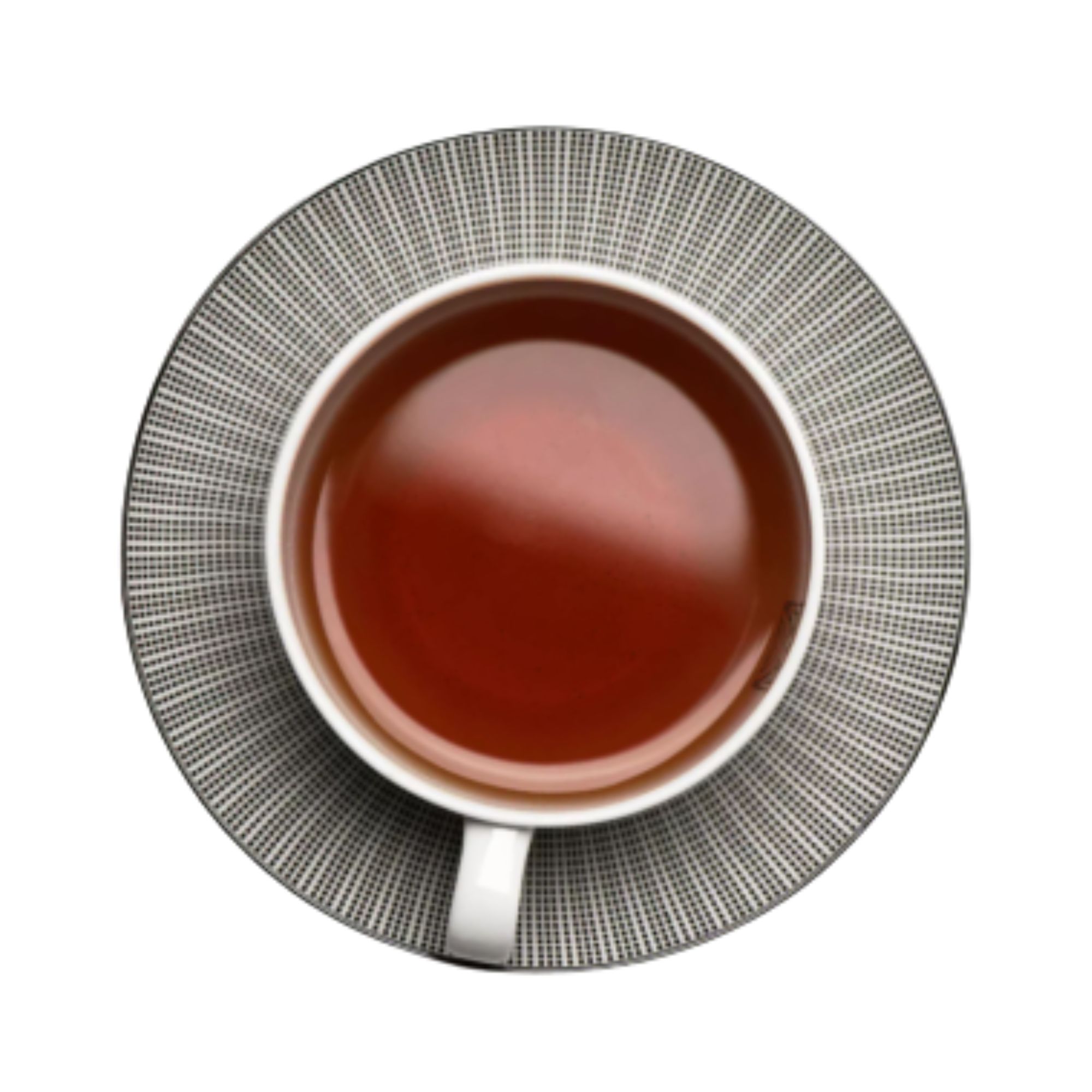 tasse contenant du thé noir vue de haut